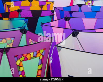 Decorated fabric of box kites sitting on the ground Stock Photo