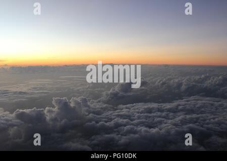 clouds from above during sundown Stock Photo