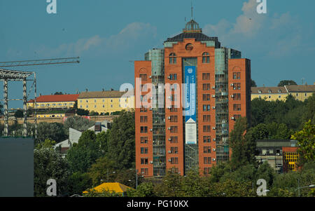 View on red bricks building and Petrovaradin fortress in background Stock Photo