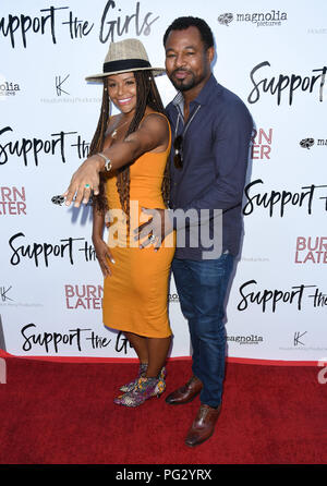 Hollywood, CA, USA. 22nd Aug, 2018. 22 August 2018 - Hollywood, California - Sugar ''Shane'' Mosley, Trisha Pisani. ''Support the Girls'' Los Angeles Premiere held at Arclight Hollywood . Photo Credit: Birdie Thompson/AdMedia Credit: Birdie Thompson/AdMedia/ZUMA Wire/Alamy Live News Stock Photo