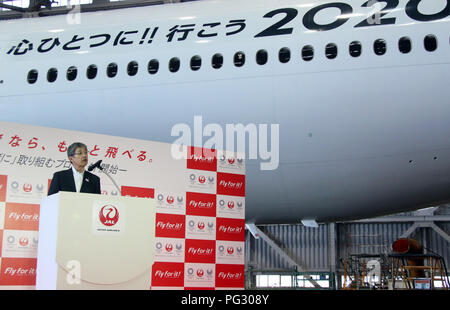 Tokyo, Japan. 23rd Aug, 2018. Japan Airlines (JAL) president Yuji Akasaka announces the business strategy for 2020 at a JAL hangar of the Haneda airport in Tokyo on Thursday, August 23, 2018. JAL will invest 10 billion yen to improve airport facilities and will change their uniforms in 2020. Credit: Yoshio Tsunoda/AFLO/Alamy Live News Stock Photo