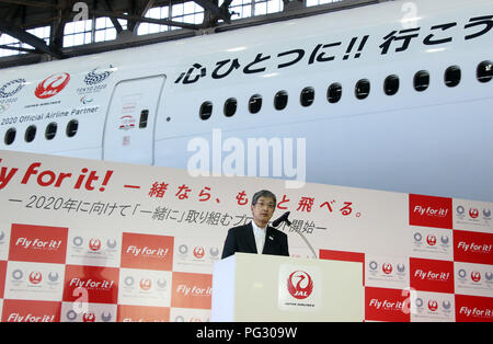 Tokyo, Japan. 23rd Aug, 2018. Japan Airlines (JAL) president Yuji Akasaka announces the business strategy for 2020 at a JAL hangar of the Haneda airport in Tokyo on Thursday, August 23, 2018. JAL will invest 10 billion yen to improve airport facilities and will change their uniforms in 2020. Credit: Yoshio Tsunoda/AFLO/Alamy Live News Stock Photo