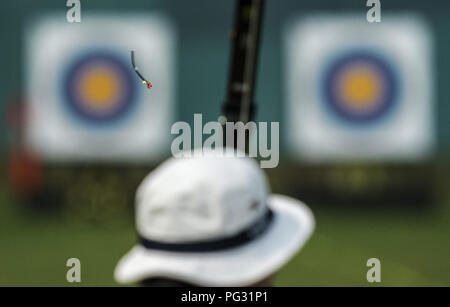 Jakarta, Indonesia. 23rd Aug, 2018. Kang Chaeyong of South Korea competes during the Recurve Women's Individual 1/16 Eliminations of Archery at the 18th Asian Games in Jakarta, Indonesia, Aug. 23, 2018. Stock Photo