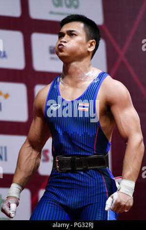 Jakarta, Indonesia. 23rd Aug, 2018. Chatuphum Chinnawong of Thailand reacts during men's weightlifting 77kg at the 18th Asian Games in Jakarta, Indonesia, Aug. 23, 2018. Credit: Cheong Kam Ka/Xinhua/Alamy Live News Stock Photo