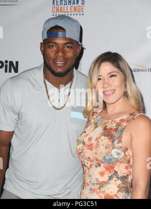 Andrea de la Torre and Yasiel Puig at 4th Annual Los Angeles Dodgers  Foundation Blue Diamond Gala held at Dodger Stadium on June 11, 2018 in Los  Angeles, CA, USA (Photo by