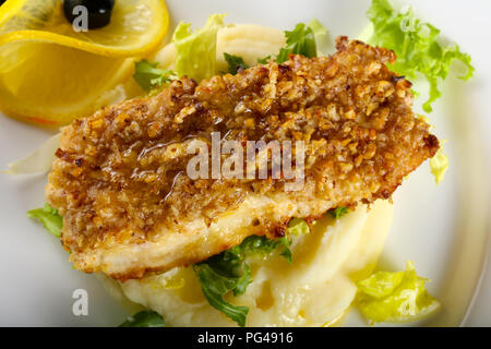 Baked Cod fish with mashed potato Stock Photo