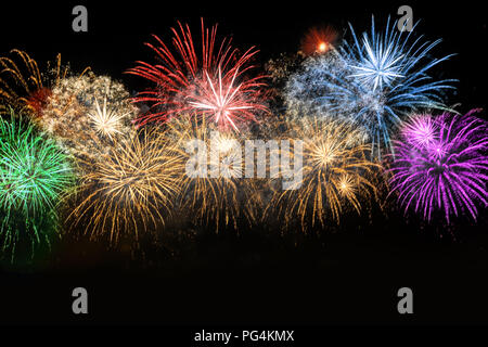 New Year celebration colorful fireworks. New year and holidays concept. Stock Photo