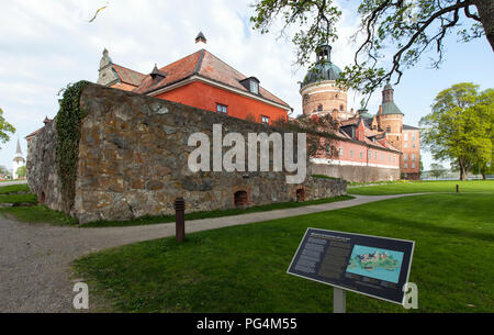 GRIPSHOLM CASTLE, SWEDEN ON MAY 11, 2018. View of the park surrounding the castle in springtime. Information board. Editorial. Stock Photo