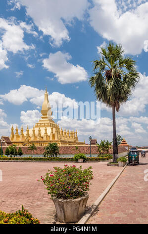 Tuk tuk near the Pha That Luang temple in Vientiane, Laos Stock Photo