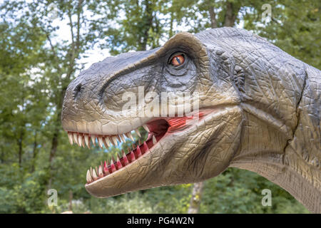 Tyrannosaurus rex model portrait in natural bush Stock Photo