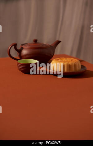 Mid-Autumn festival, an asian celebration, served with traditional mooncake. Text mean Happiness. Stock Photo