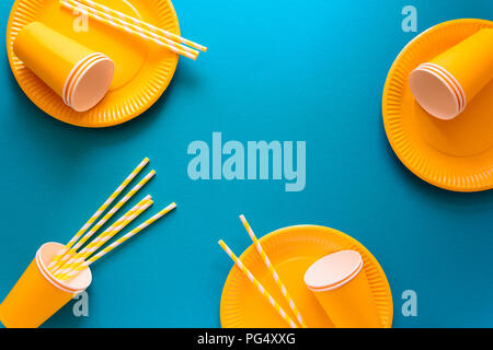 Table setting with paper ware for summer picnic or BBQ. Top view. Flat lay. Stock Photo