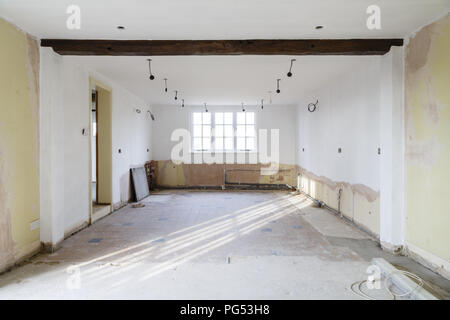 Empty room in an old house undergoing refurbishment, remodeling and redecoration, in preparation for a kitchen refit Stock Photo