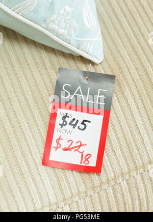 Mock-up of price tag showing reduced price of a discounted product on sale in a retail store. Priced in dollars for US market Stock Photo