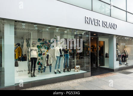 Shop windows with mannequins & clothes and entrance of the River Island fashion store in Kilmarnock, East Ayrshire, Scotland. Stock Photo