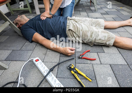 Symbolic picture, first aid, scene posted, resuscitation with a cardiac ...