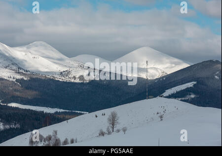 Morning winter snow covered scenery picturesque alp mountain ridge (Ukraine, Carpathian Mountains, Chornohora Range, tranquility peaceful view from Dz