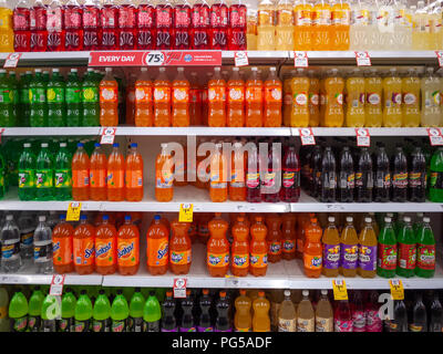 A variety of soft drinks in different brands and flavors on the supermarket shelf. Melbourne, VIC Australia.