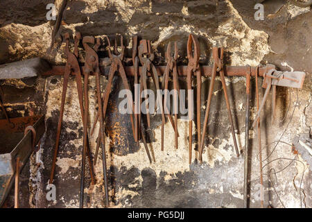 Old forging tools in a workshop Stock Photo