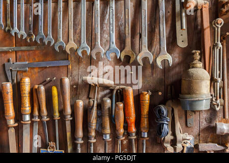 Old tool panel with various tools Stock Photo