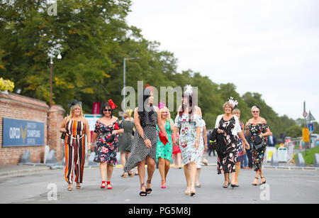 Racegoers arriving for Darley Yorkshire Oaks & Ladies Day of the Yorkshire Ebor Festival at York Racecourse. Stock Photo