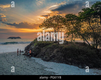 People enjoying the Sunset on the Beach, Corcovado National Park, Osa Peninsula, Costa Rica. This image is shot using a drone. Stock Photo