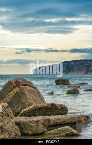 Filey bay Beach on Yorkshire coast near Reighton Gap and Speeton at sunrise Stock Photo
