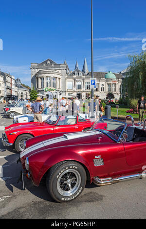 Oldtimers / classic cars in front of the Casino de Spa and brasserie in summer in the city Spa, Liège, Belgium Stock Photo