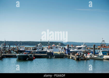 Fishing boats in Poole Harbour, Dorset, UK Stock Photo