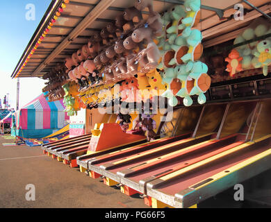 Geddes, New York, USA. August 23, 2018. Ball toss game of chance on the midway at the New York State Fair before opening Stock Photo