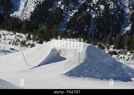 Snowboarding ramp for big jumps at mountain Stock Photo