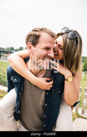 Portrait of happy couple having fun outdoors Stock Photo