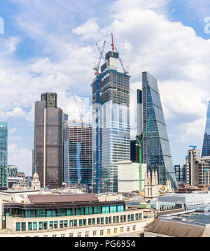 City of London changing skyline: 22 and 100 Bishopsgate under construction between Tower 42 and the Cheesegrater, financial and insurance district Stock Photo