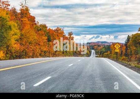Canada, Ontario, main road through colorful trees in the Algonquin park area Stock Photo