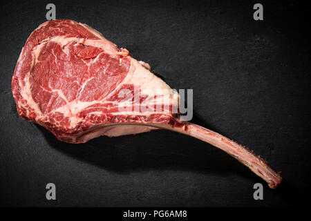 Raw tomahawk steak Stock Photo
