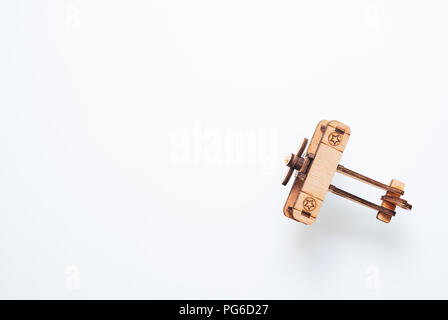 Wooden plane,airplane model on white background. Top view, Flat Lay style with copy space. Stock Photo