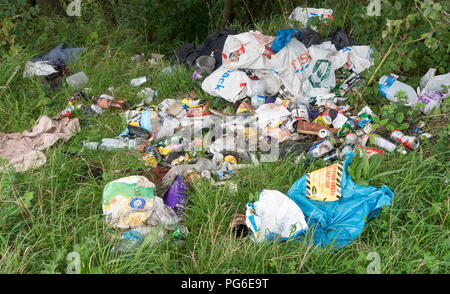 Rubbish fly tipped alongside the C2C cycle track in Co. Durham, England, UK Stock Photo