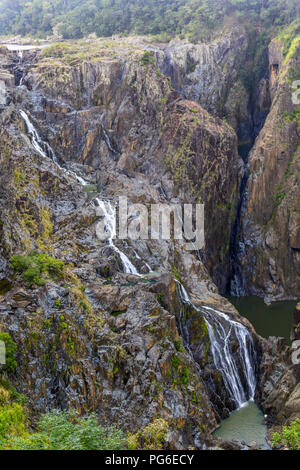 Waterfall flowing over rocks at Barron Falls Gorge Stock Photo