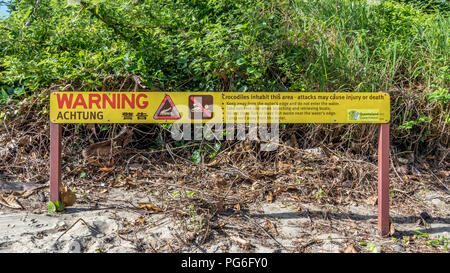Crocodile warning sign on Australian beach Stock Photo