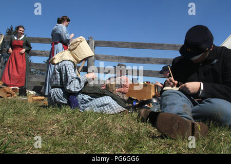 The Confederate Army camping during the American Civil War. Moments of rest. Historical reenactment at Appomattox, Virginia. Stock Photo