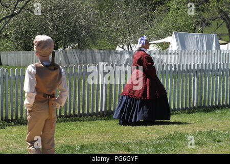 The Confederate Army camping during the American Civil War. Village people around the camp. Historical reenactment at Appomattox, VA, USA. Stock Photo