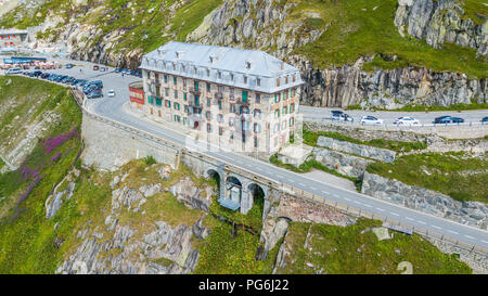 The Furka Pass with an elevation of 2,429 metres (7,969 ft), is a high mountain pass in the Swiss Alps connecting Gletsch, Valais with Realp, Uri. The Stock Photo