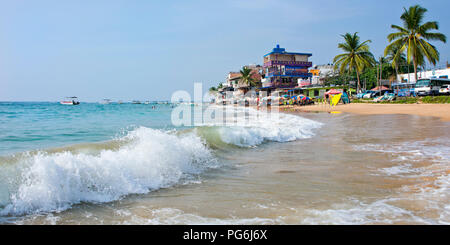 Horizontal panoramic view of the beach in Hikkaduwa, Sri Lanka. Stock Photo