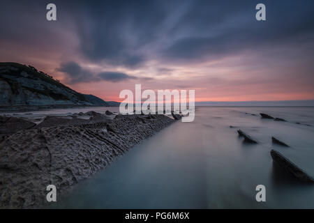 Sunset at Sakoneta beach, Geopark in Deba, Spain Stock Photo