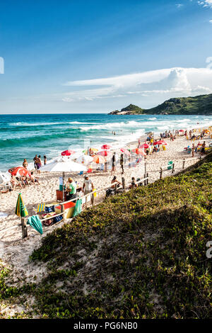 Mole Beach, one of the most crowded beaches of Island of Santa Catarina during summer season. Florianopolis, Santa Catarina, Brazil. Stock Photo