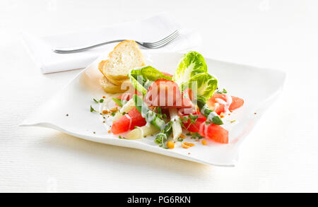 Watermelon asparagus salad with ham Stock Photo