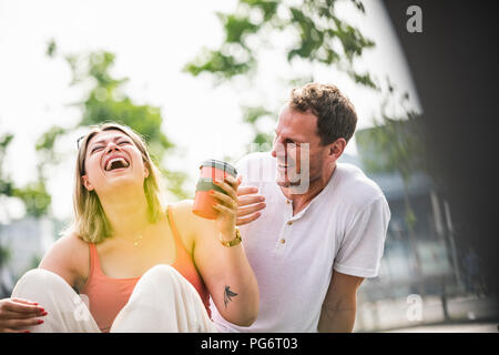 Happy couple having fun outdoors Stock Photo