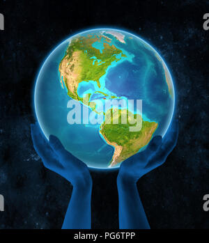Jamaica in red on globe held in hands in space. 3D illustration. Stock Photo