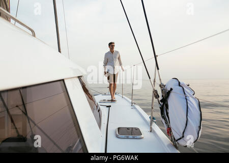 Marure man on catamaran Stock Photo