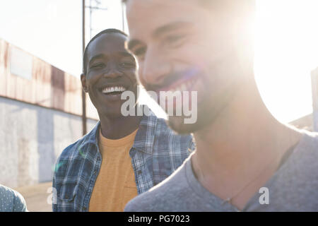 Two happy young men outdoors Stock Photo